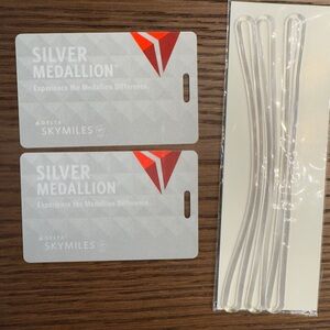 Delta Silver Medallion Bag Tags New 2